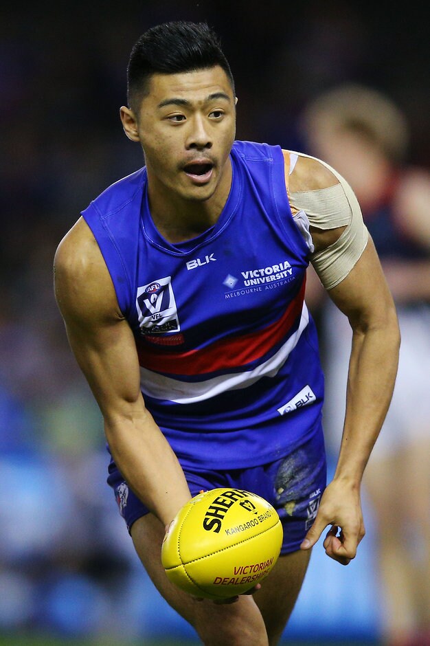 2016 VFL Grand Final - Footscray Bulldogs v Casey Scorpians MELBOURNE, AUSTRALIA - SEPTEMBER 25: Lin Jong of Footscray runs with the ball during the VFL Grand Final match between Footscray Bulldogs and Casey Scorpions at Etihad Stadium on September 25, 2016 in Melbourne, Australia. (Photo by Michael Dodge/AFL Media)